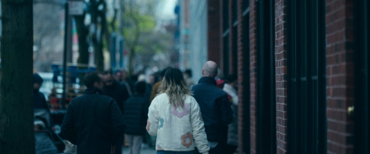 Interstitial: people on sidewalk.
