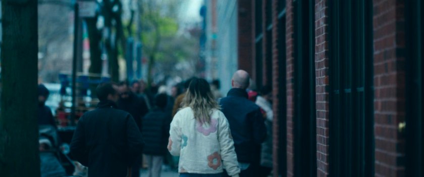 Interstitial: people on sidewalk.