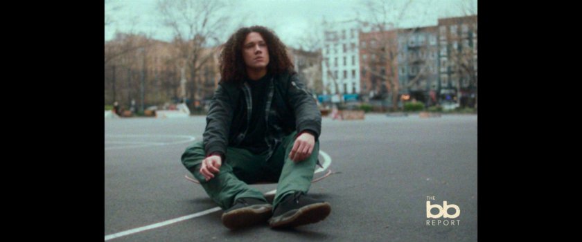 BB Report: man interviewed sitting on basketball court.