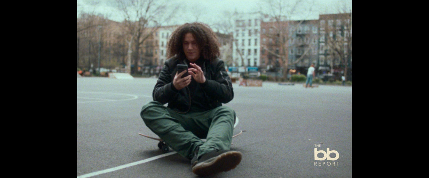 BB Report: man interviewed sitting on basketball court.