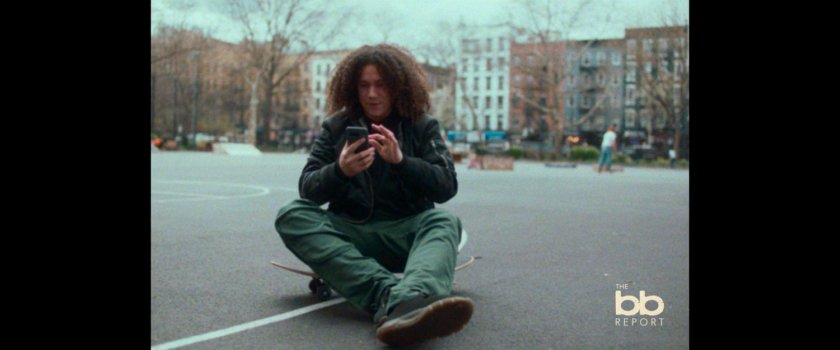 BB Report: man interviewed sitting on basketball court.