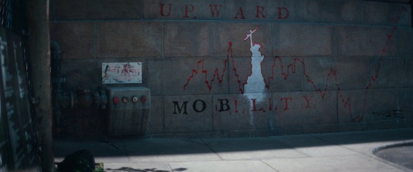 Interstitial: 'upward mobility' graffiti.