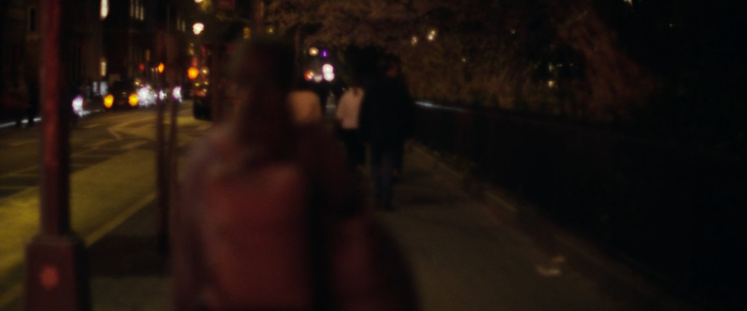 Interstitial: dark sidewalk.