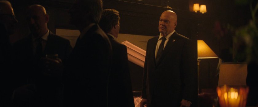 Jack Duquesne speaking with Fisk at charity event.