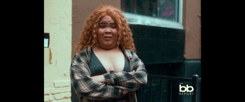 BB Report: interview with woman outside apartment building.