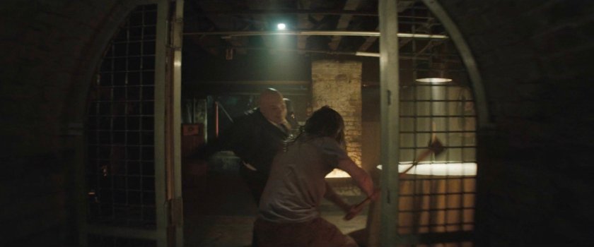 Adam fighting Fisk with an ax.