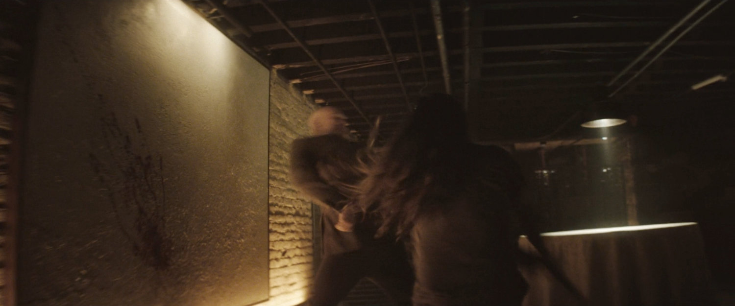 Adam fighting Fisk with an ax.