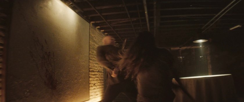 Adam fighting Fisk with an ax.