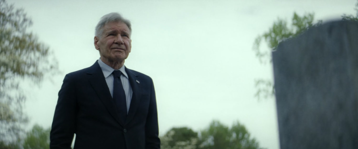 President Ross at a cemetery.