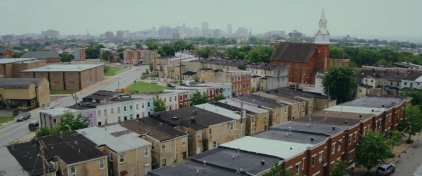 Aerial of Baltimore buildings and street.
