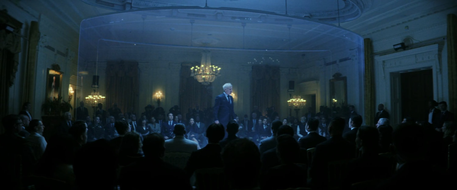 President Ross presenting to the gathered crowd in the East Room.