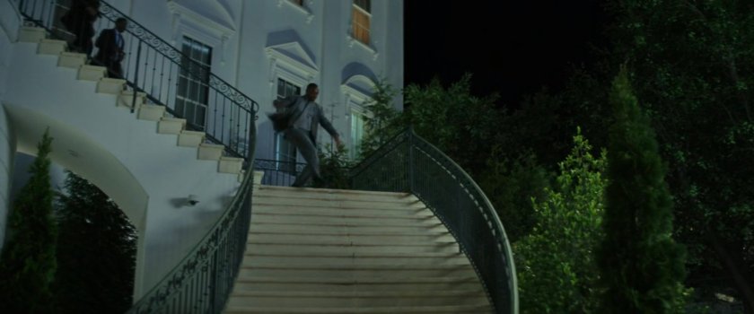 Sam running down the steps in the back of the White House.