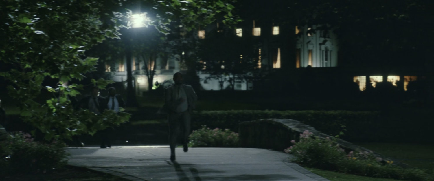 Sam and guards running from the White House.