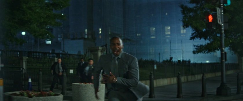 Sam running across 15th St NW toward Pershing Park.