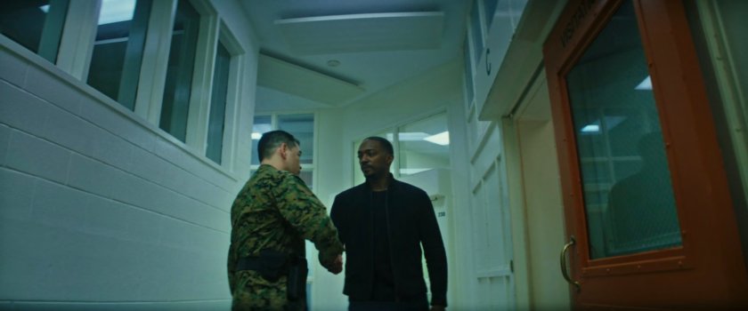 Sam and Sergeant Payumo inside of Joint Base Anacostia-Bolling prison.