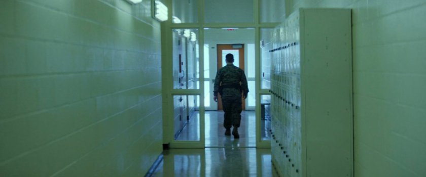 Payumo in hallway in Joint Base Anacostia-Bolling prison.