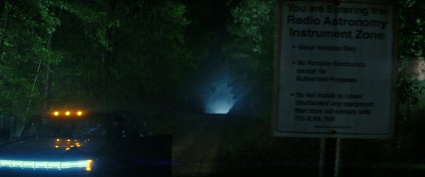 Road outside Camp Echo One at nighttime.