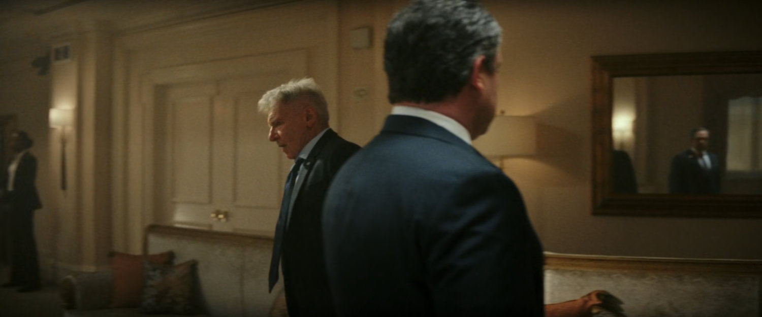 President Ross and two advisors in his hotel room in Tokyo.