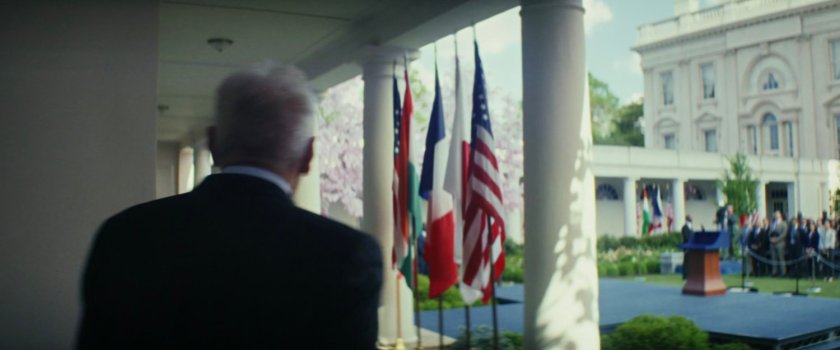 President Ross entering the Rose Garden at the White House.