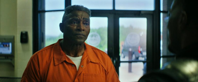 Isaiah at the entrance of Joint Base Anacostia-Bolling prison.