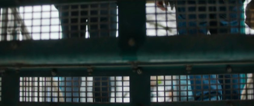 Interstitial: people descending stairs as seen from underneath.