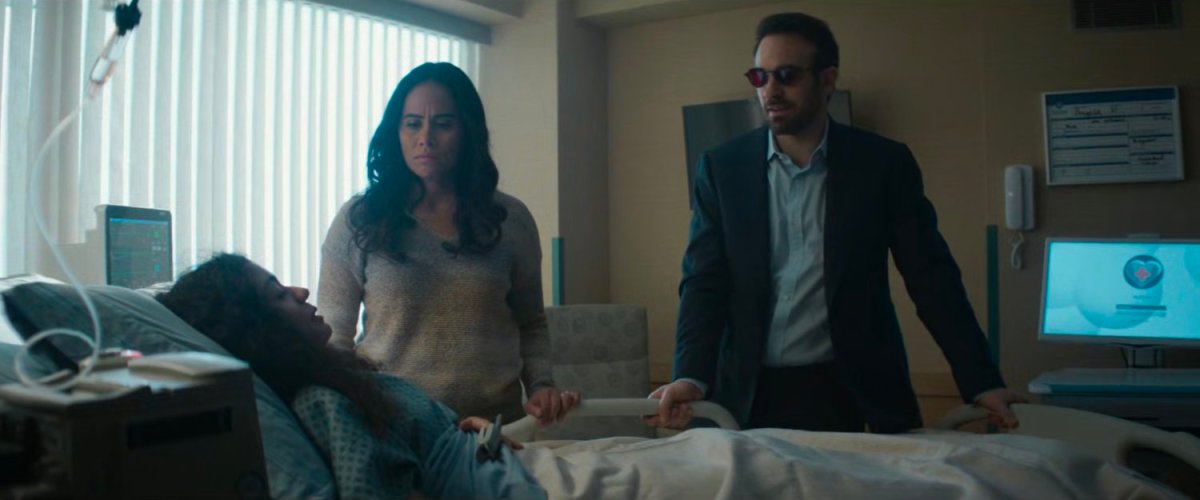 Soledad and Matt in Angela's hospital room.