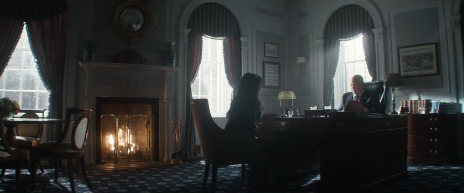Detective Kim and Mayor Fisk in his office.