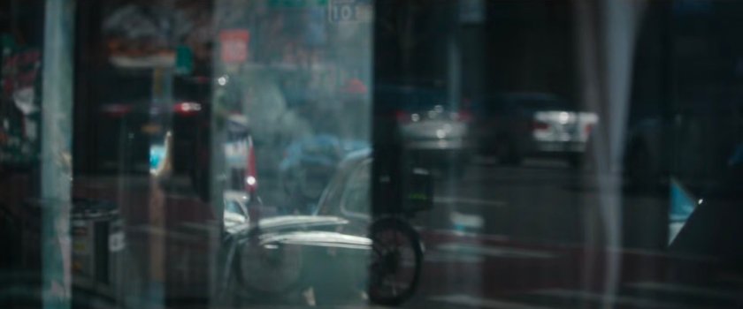 Interstitial: reflection in store front windows.