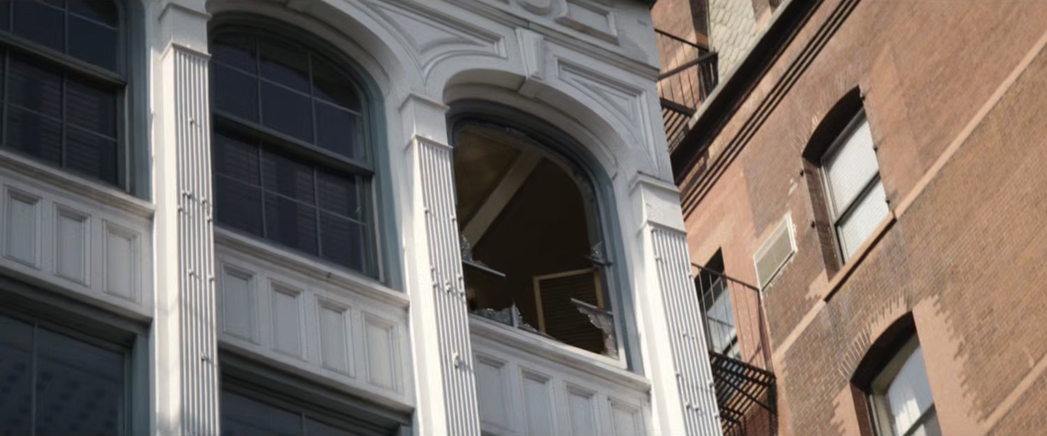 Exterior of broken window on Heather's office.