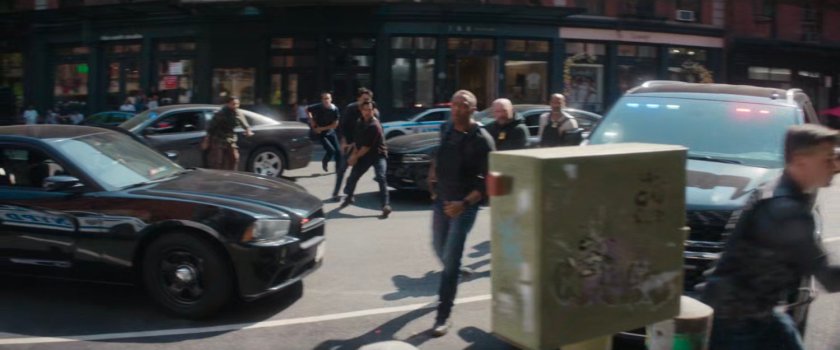 Police officers outside Heather's office.