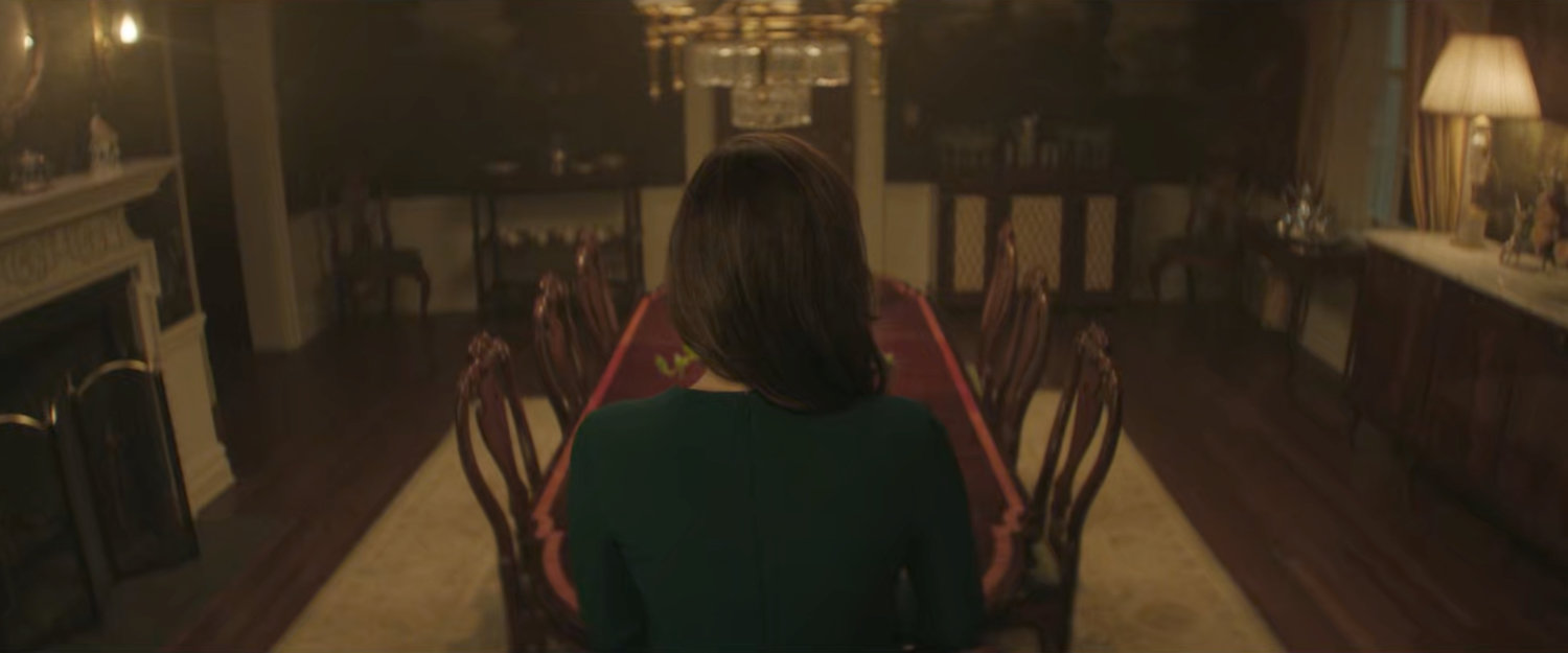 Vanessa sitting at the dining table in Gracie Mansion.
