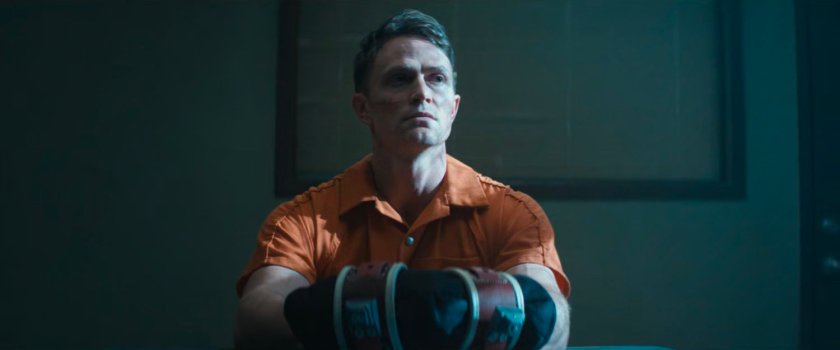 Dex in a visitor room at Ryker's Island Penitentiary.