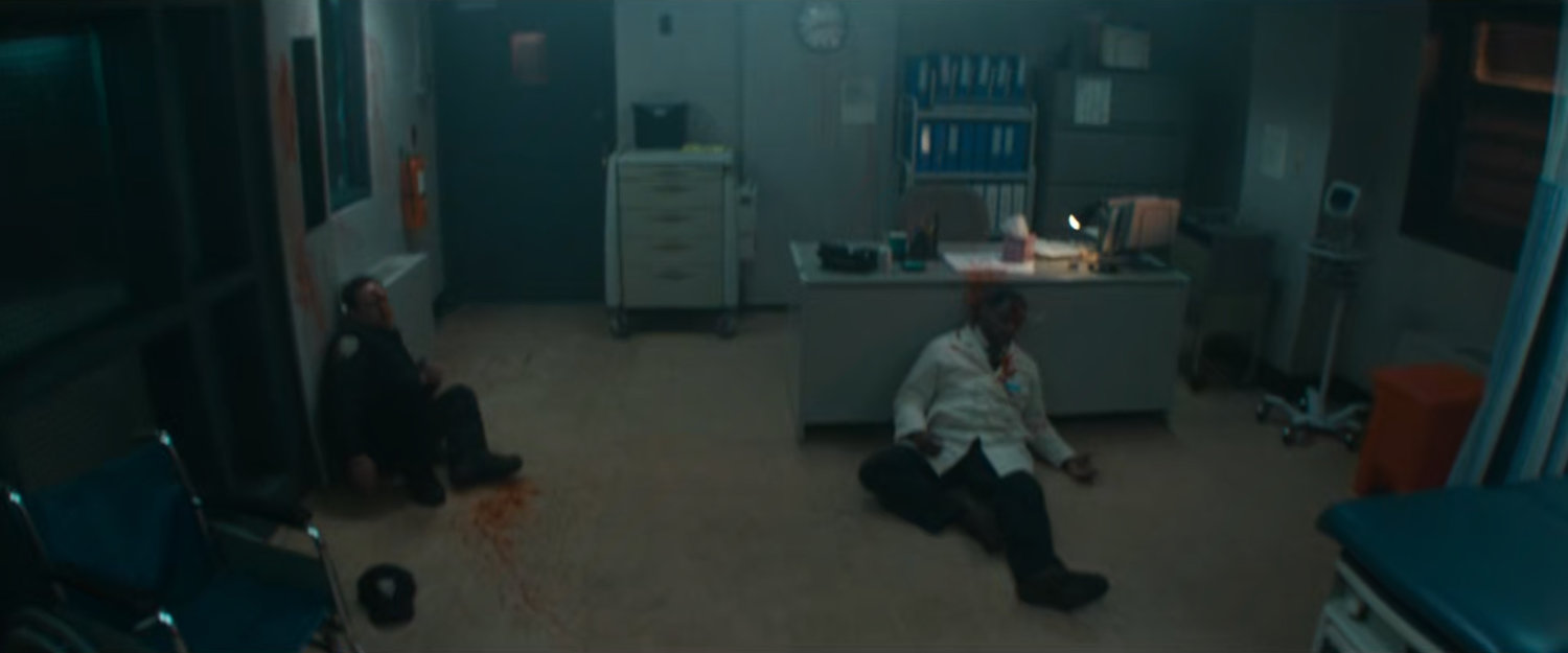 Two dying men in the hospital at Ryker's Island Penitentiary.
