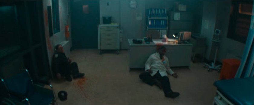 Two dying men in the hospital at Ryker's Island Penitentiary.