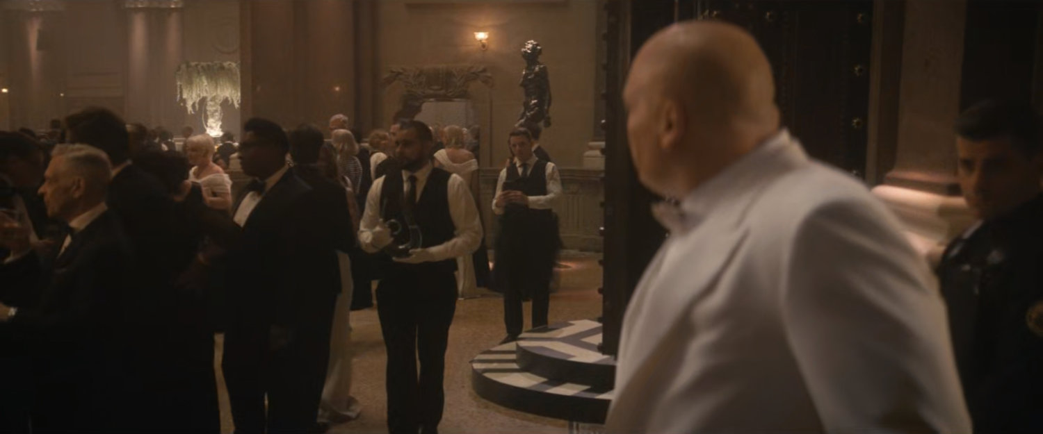Fisk spies a reporter at the Black & White Ball.