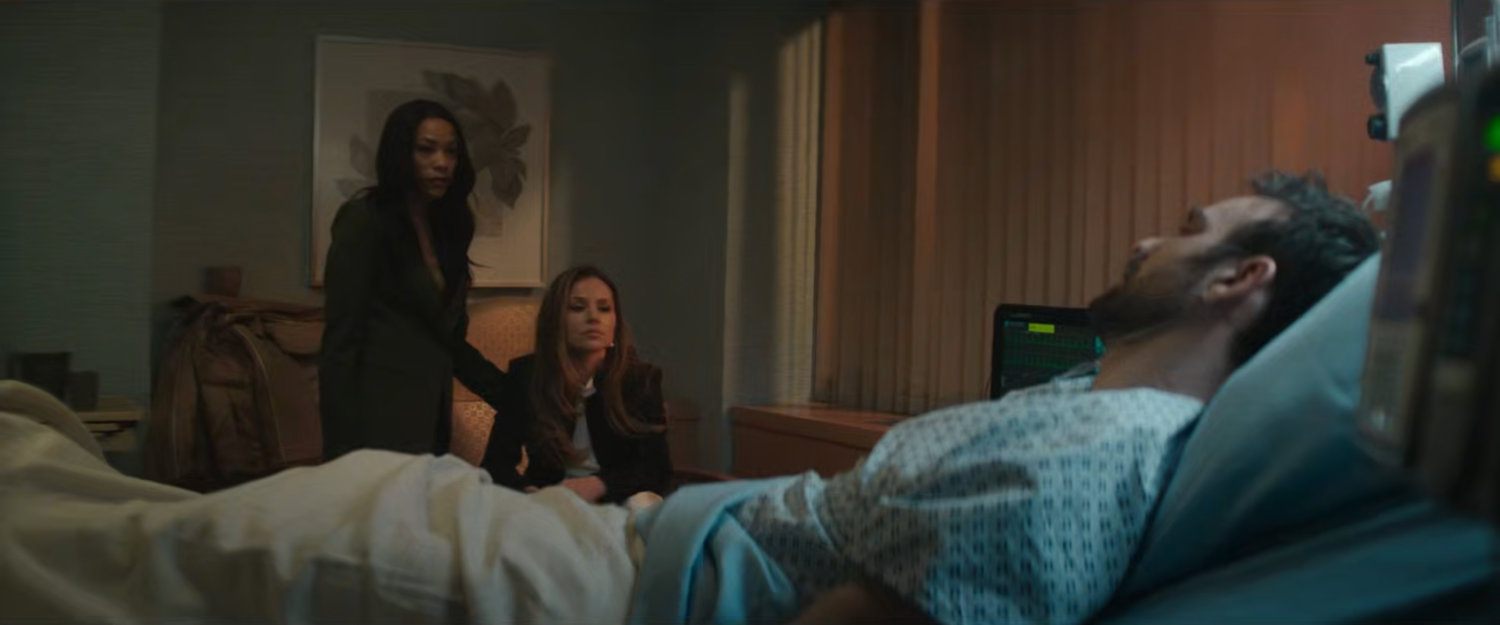 Kirsten, Heather, and Matt in a Metro-General hospital room.