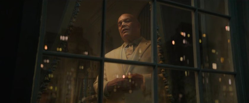 Fisk looking out his window at City Hall.