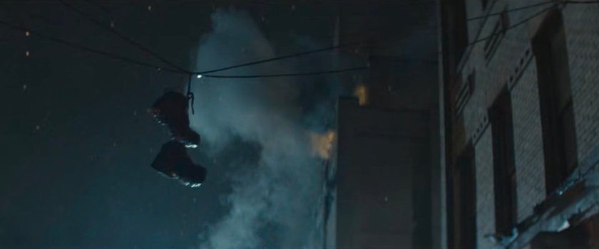 Shoes hanging on wire outside Matt's apartment building.