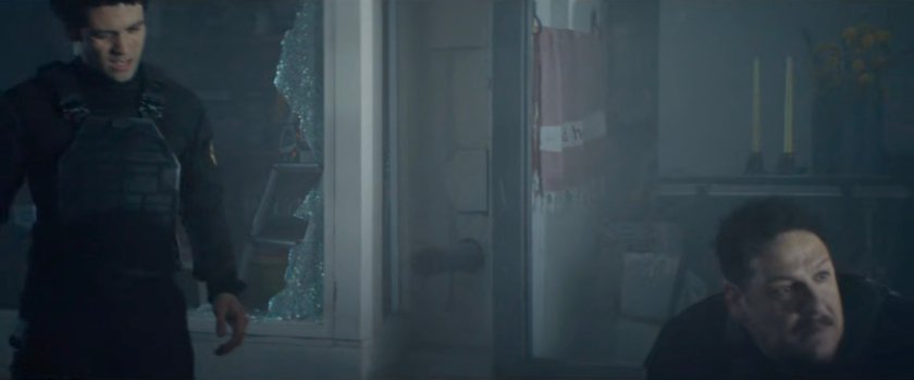 Task Force officers outside hardware store.