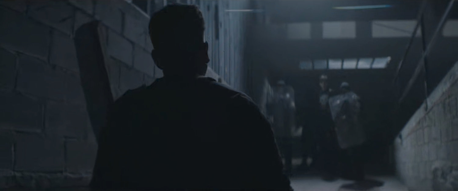 Frank entering Red Hook port building towards Task Force officers.