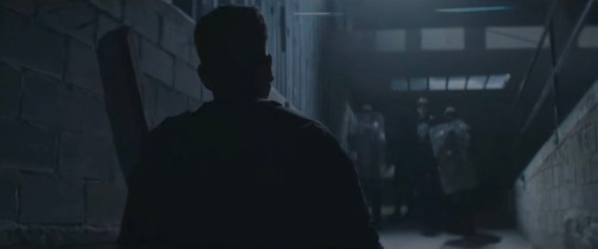 Frank entering Red Hook port building towards Task Force officers.