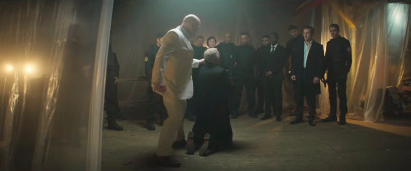 Fisk kills Commissioner Gallo before a group of Task Force officers.