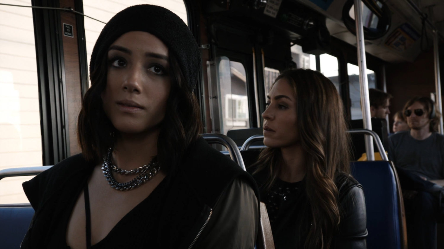 Daisy and Yo-Yo on a city bus.