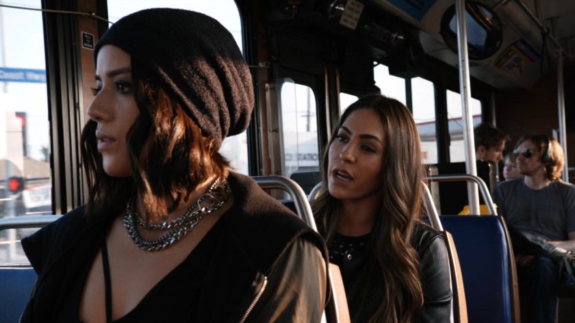 Daisy and Yo-Yo on a city bus.