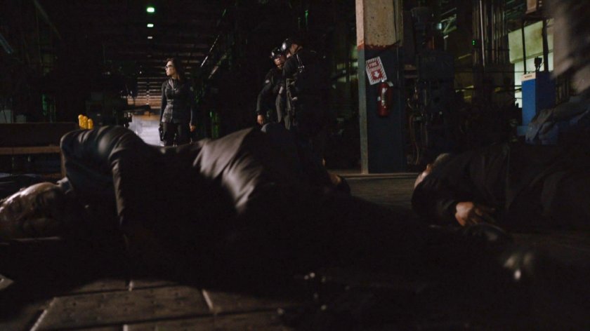 Agent May inside Cosmogenic Manufacturing with downed henchmen.