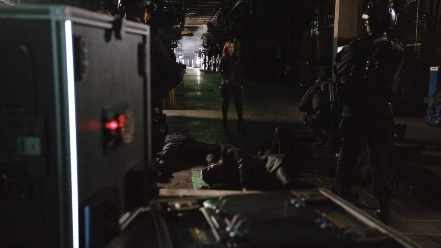 Agent May inside Cosmogenic Manufacturing with downed henchmen.