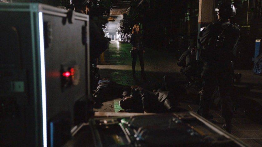 Agent May inside Cosmogenic Manufacturing with downed henchmen.