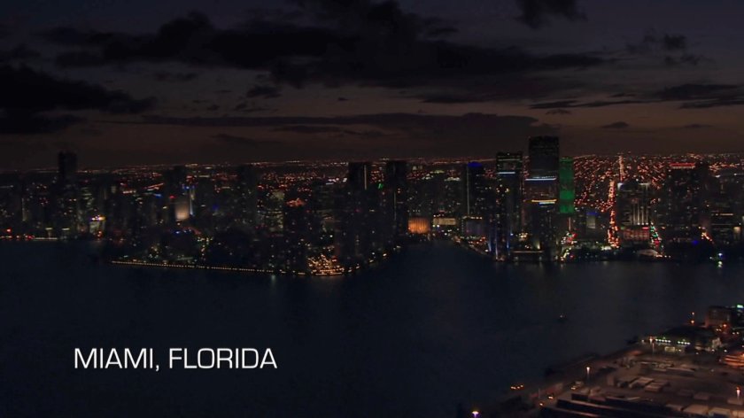 Night aerial of Miami. Text: Miami, Florida.