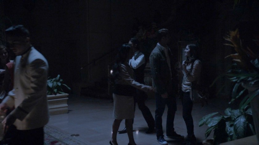 People in blacked out Miami hotel lobby.