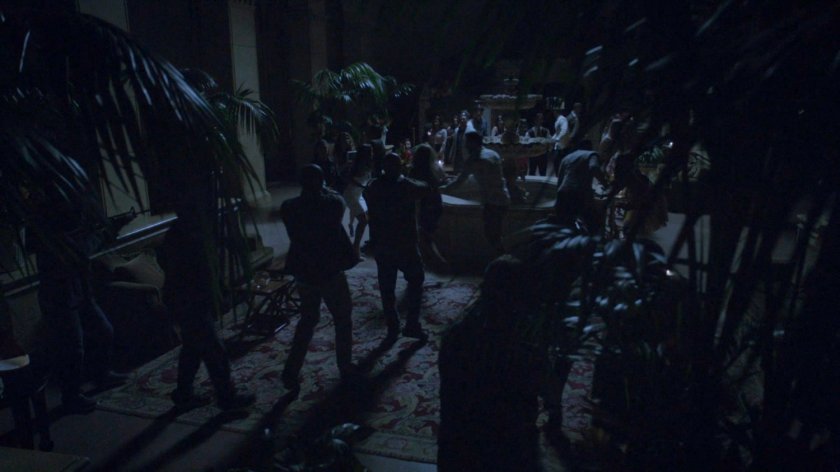 People in blacked out Miami hotel lobby.